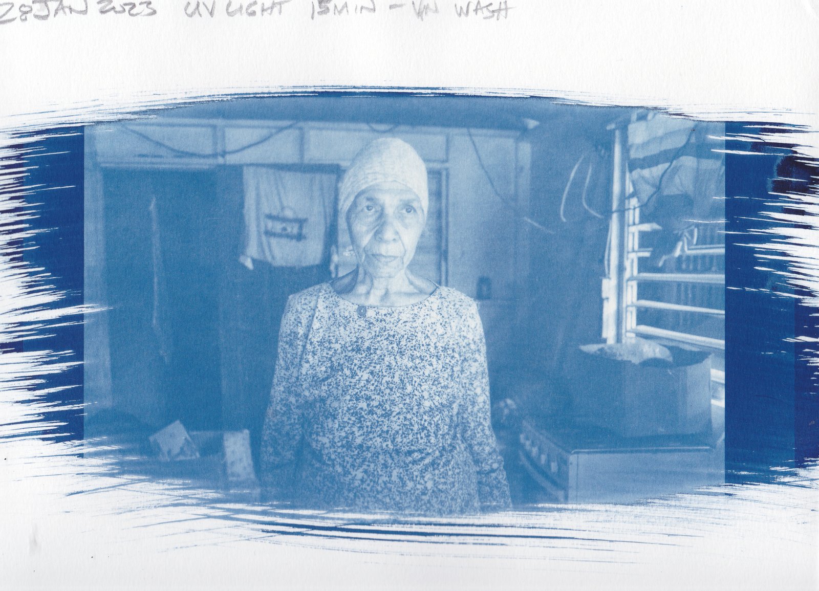 Paper test — woman in striped tank, refrigerator open behind her, vinegar-toned cyanotype on paper, 17.5min UV exposure, 28 Jan 2023